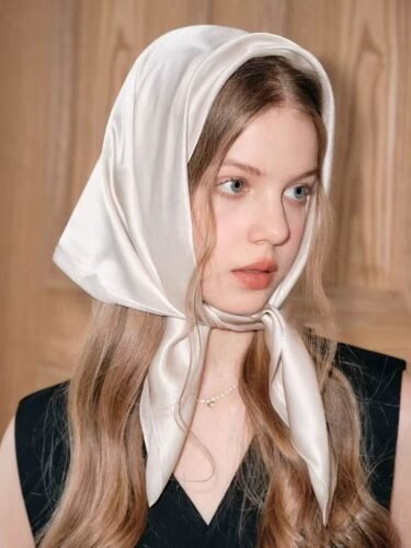 Woman waking up with smooth hair asking is satin head scarf good for hair