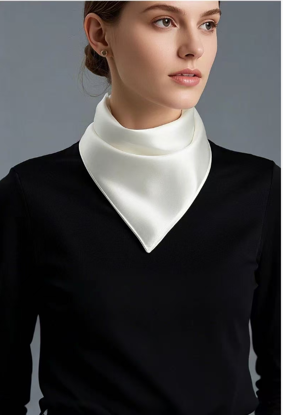 How to Wear a Triangle Scarf: 5 Chic Ways to Style 2 Woman wearing a plaid triangle scarf styled in a relaxed bandana look for fall fashion